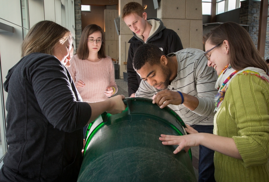 Green Advisors sort through a campus trash bin.